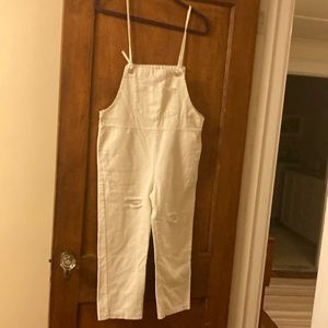 Unique white denim overalls. Bottom at ankle. straight leg. Like new